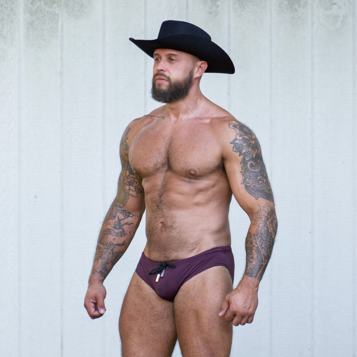Stuart in the Gruff Pup Bulge Boost Swim Brief (Burgundy)