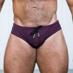 Stuart in the Gruff Pup Bulge Boost Swim Brief (Burgundy)