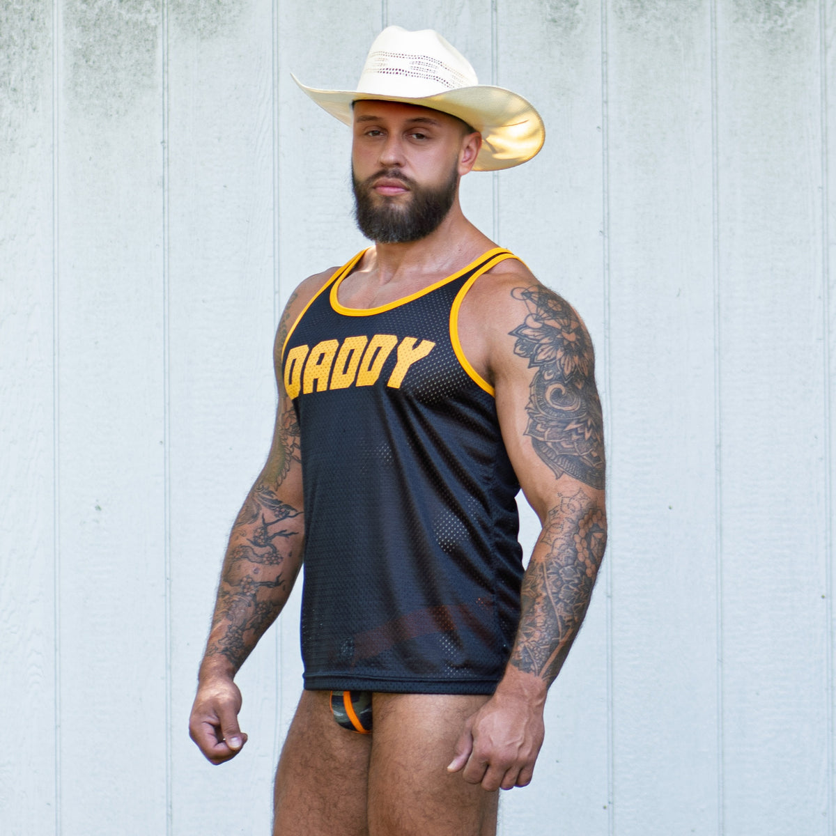 Sexy mens Daddy tank top and jockstrap outfit in breathable mesh for gym or club