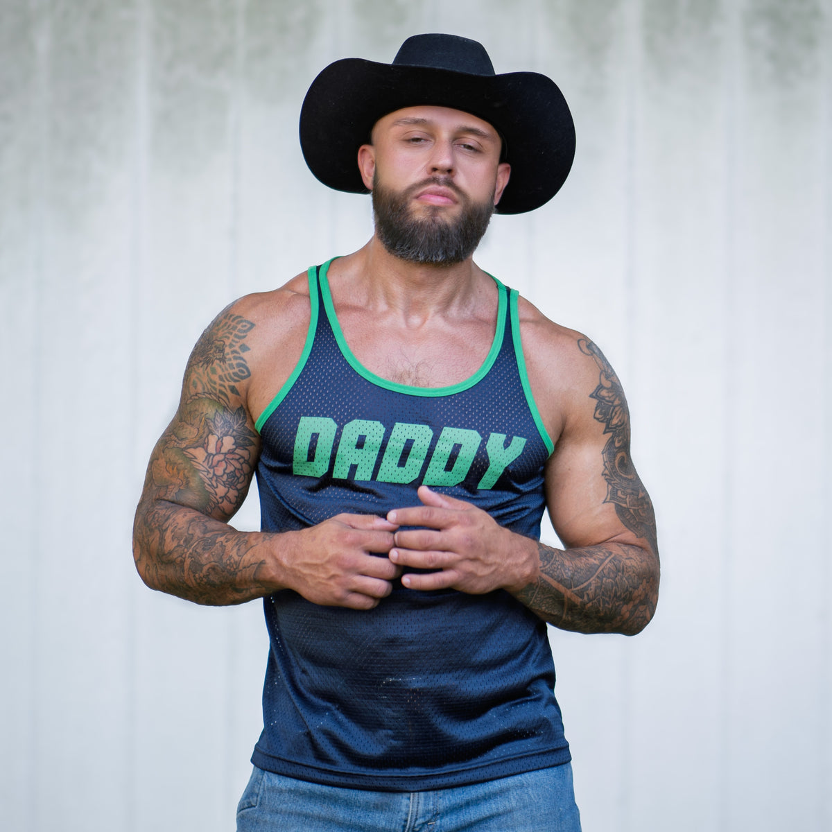 see-through mesh tank top in navy with Daddy written on the front with navy mesh and green accents