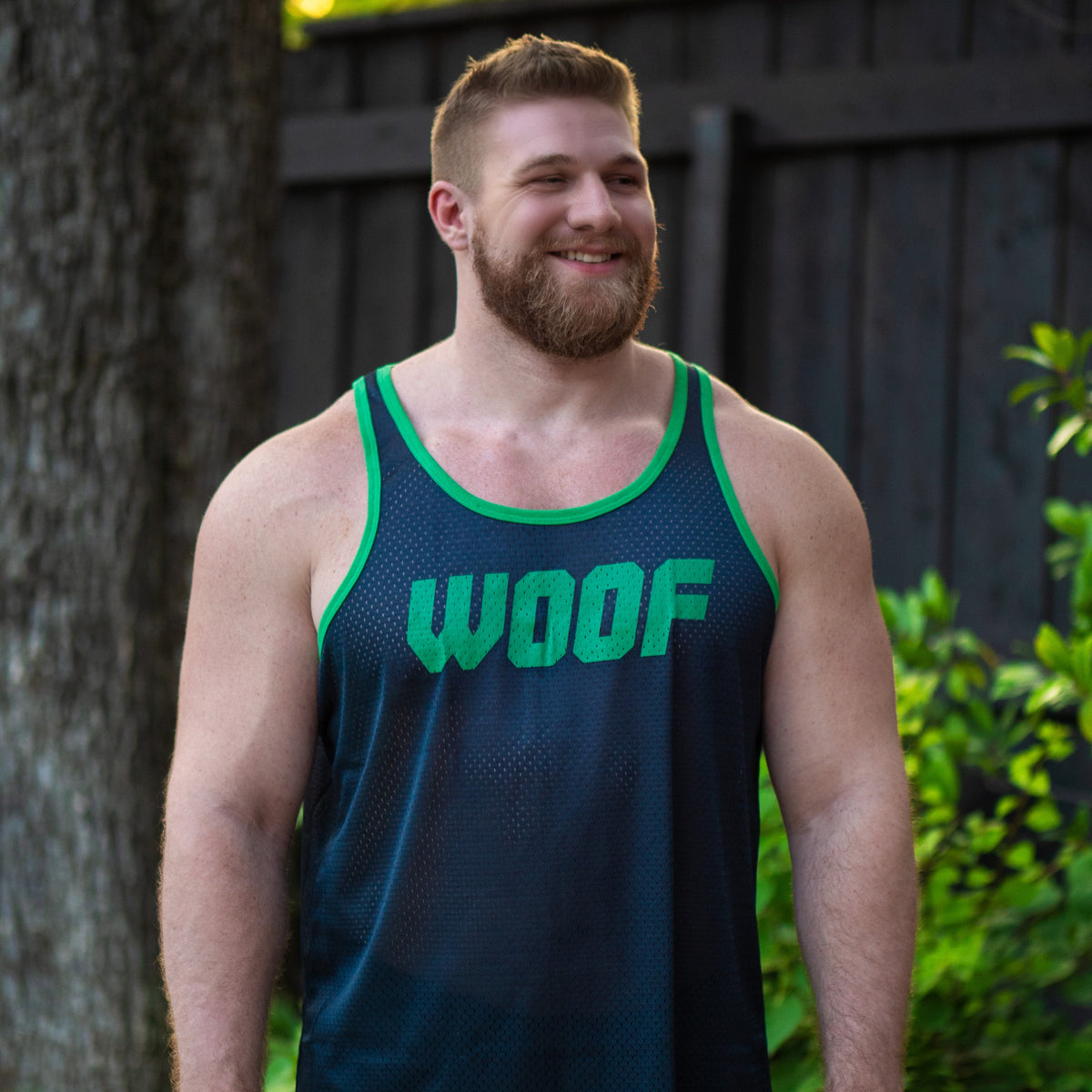 woof-navy -> Riley in his Gruff Pup Air Tank which features a single layer of stretch mesh