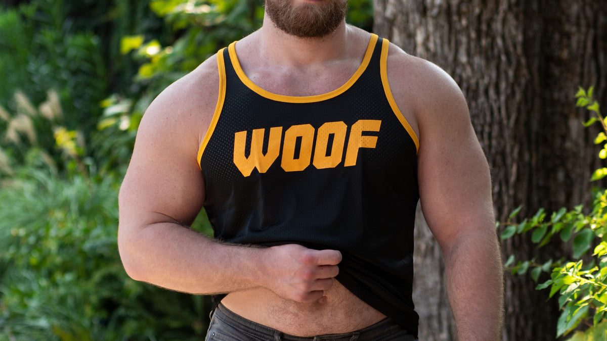 Man modeling a black Gruff Pup Woof Air Tank